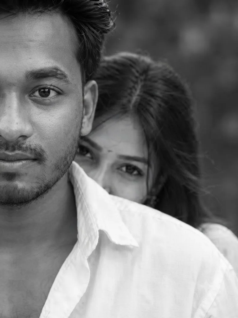 The Peeking Gaze: Intimate Monochrome Portrait